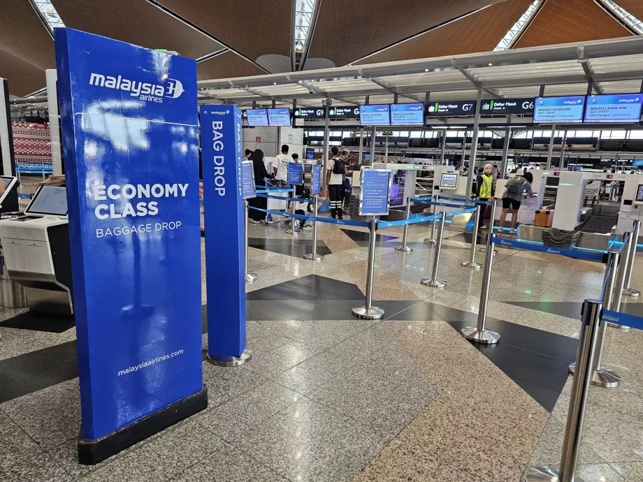 Odprawa, Malaysia Airlines
